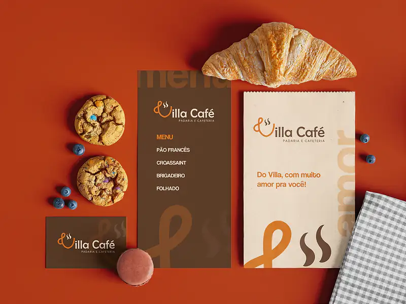 Cardápio, saco de pão e cartão da Villa Café